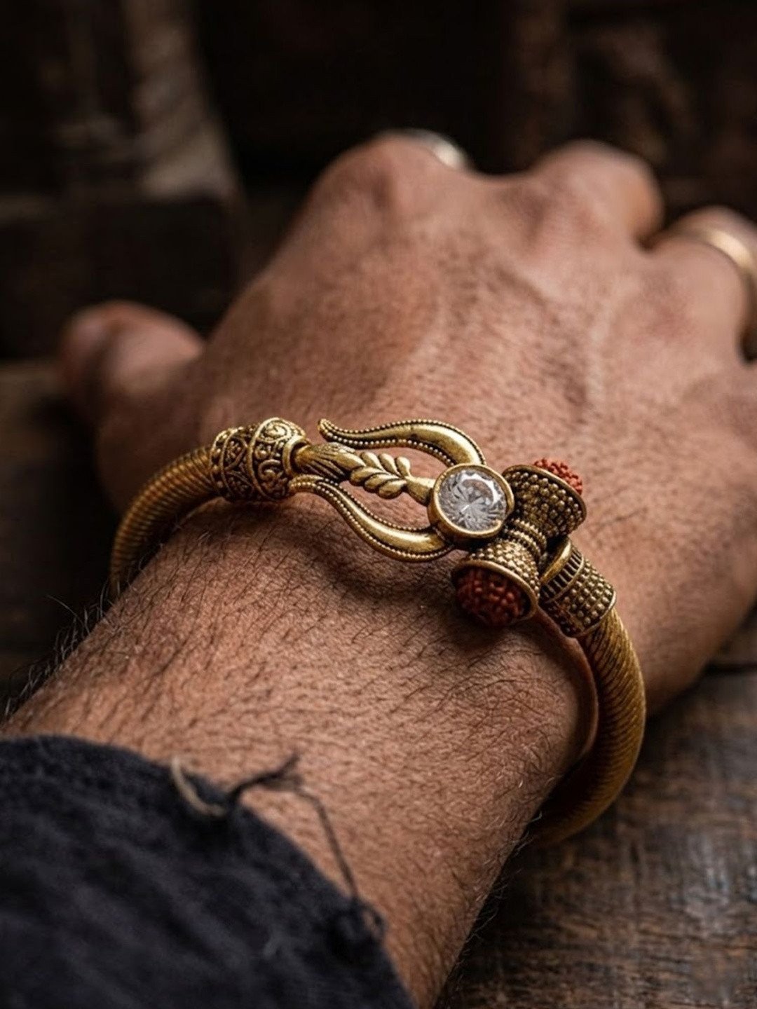 NVR Gold Plated Trishool Design Rudraksh Rakhi Bracelet With Roli Chawal Chandan Mishri