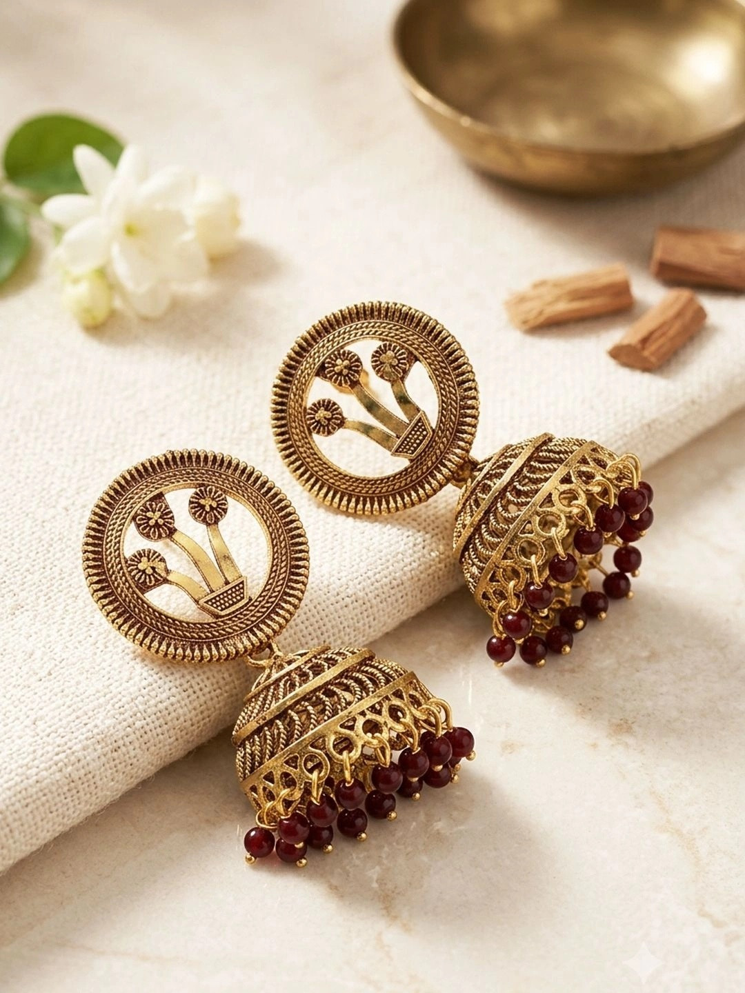 ANIKAS CREATION Gold-Toned Dome Shaped Jhumkas