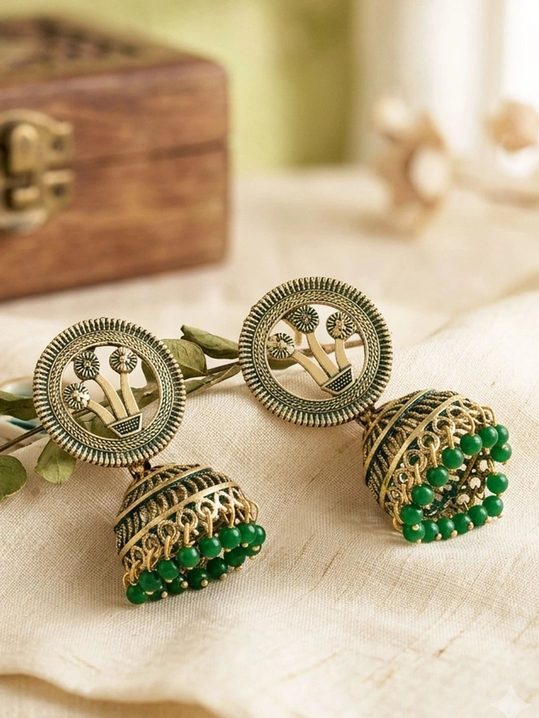 ANIKAS CREATION Green & Gold-Toned Dome Shaped Jhumkas