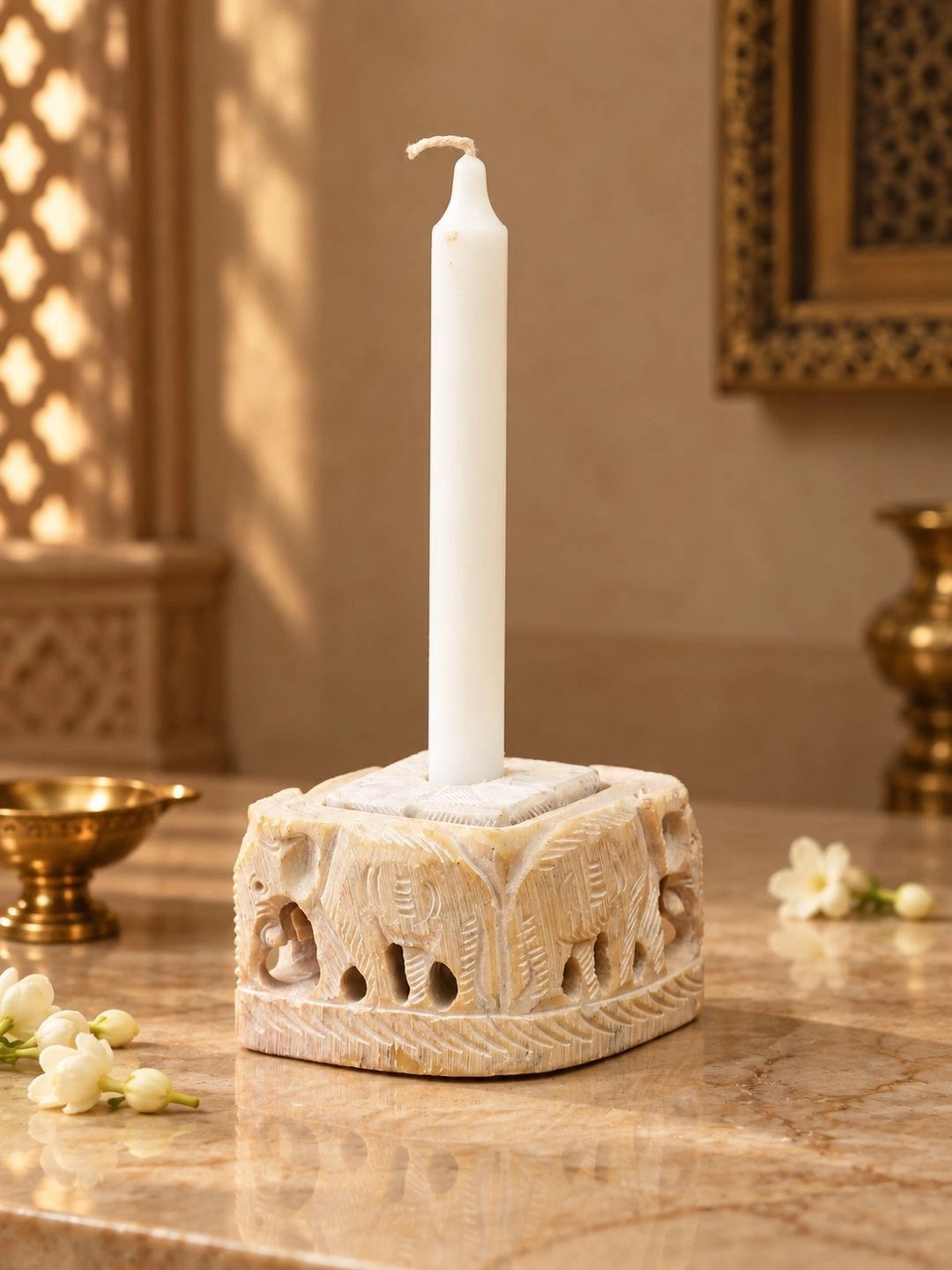 Aapno Rajasthan Beige Carved Elephant Candle Stand
