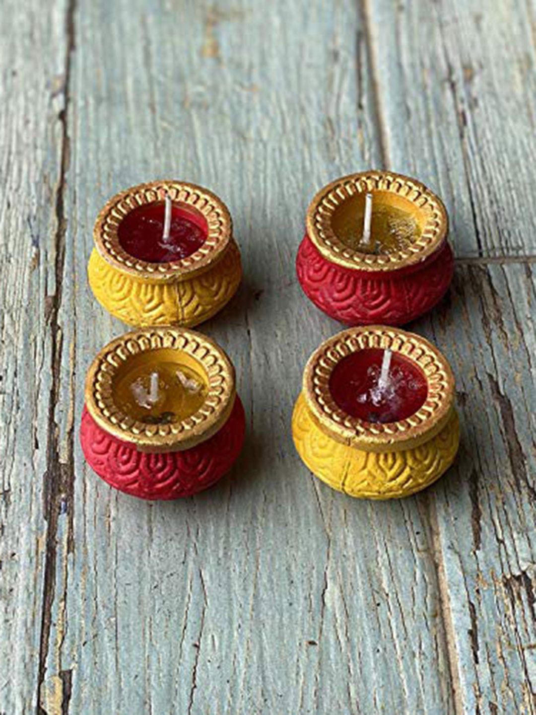 Ariana Set of 4 Yellow & Maroon Textured Terracotta Pooja Diyas