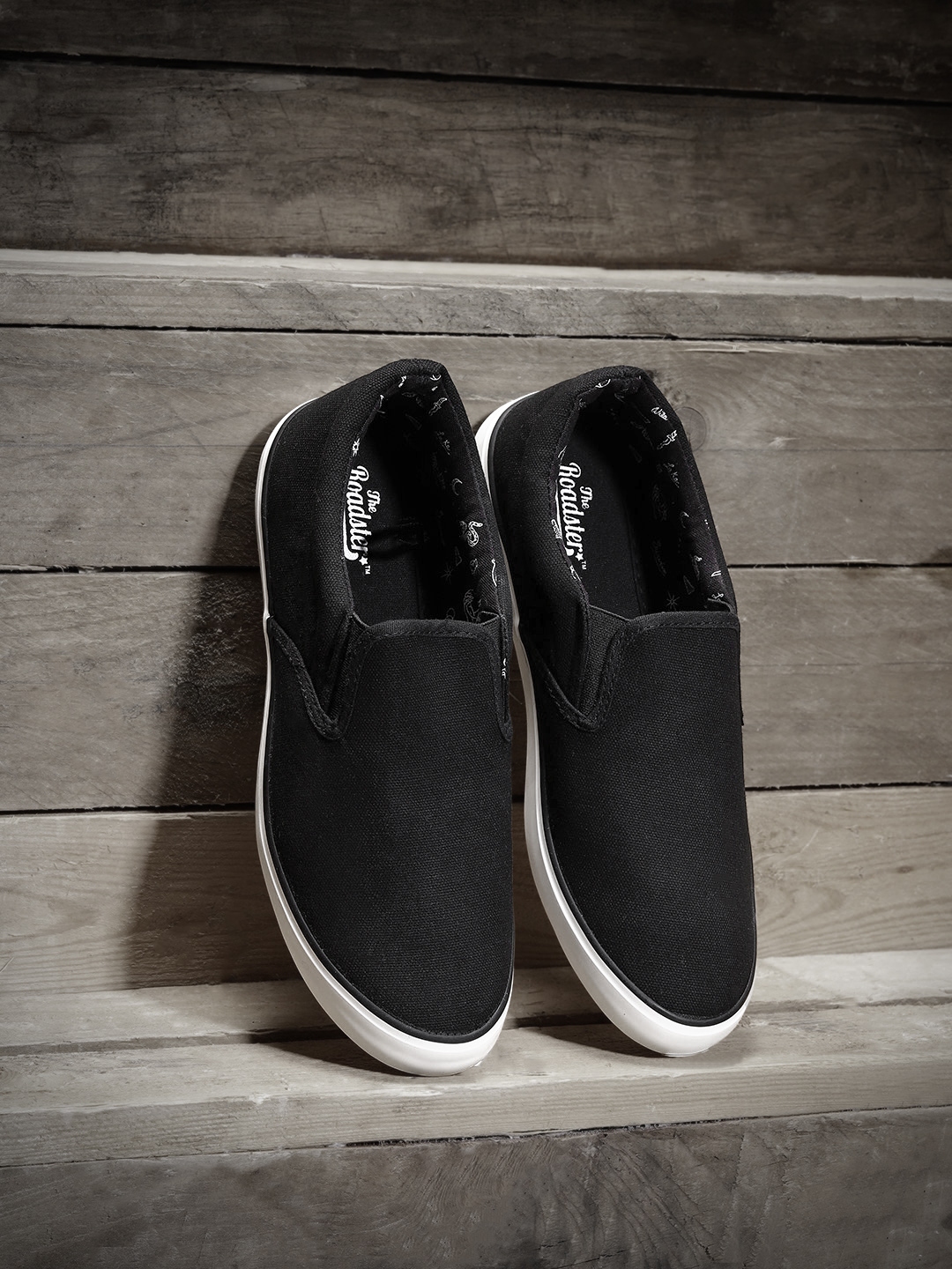 roadster men black slip on sneakers