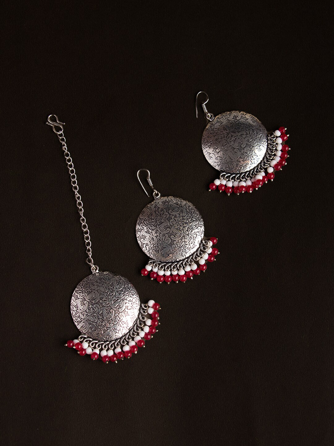 Ozanoo Silver-Toned & Red Circular Drop Earrings With Maang Tikka