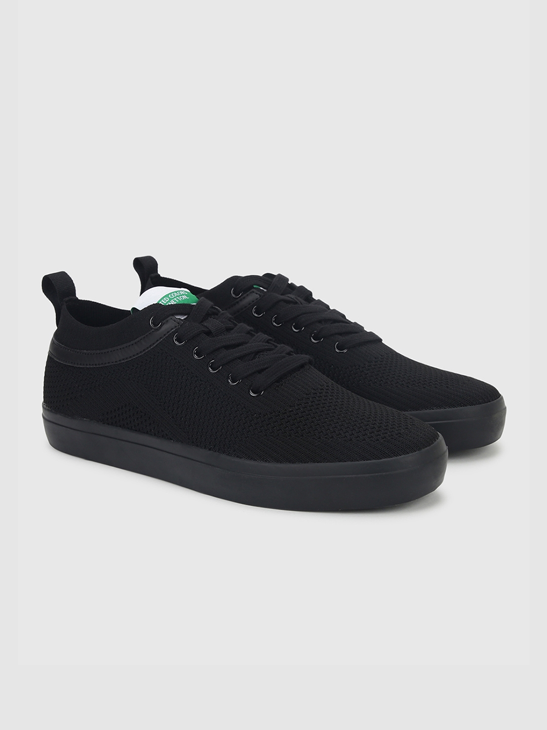 Benetton black sneakers discount
