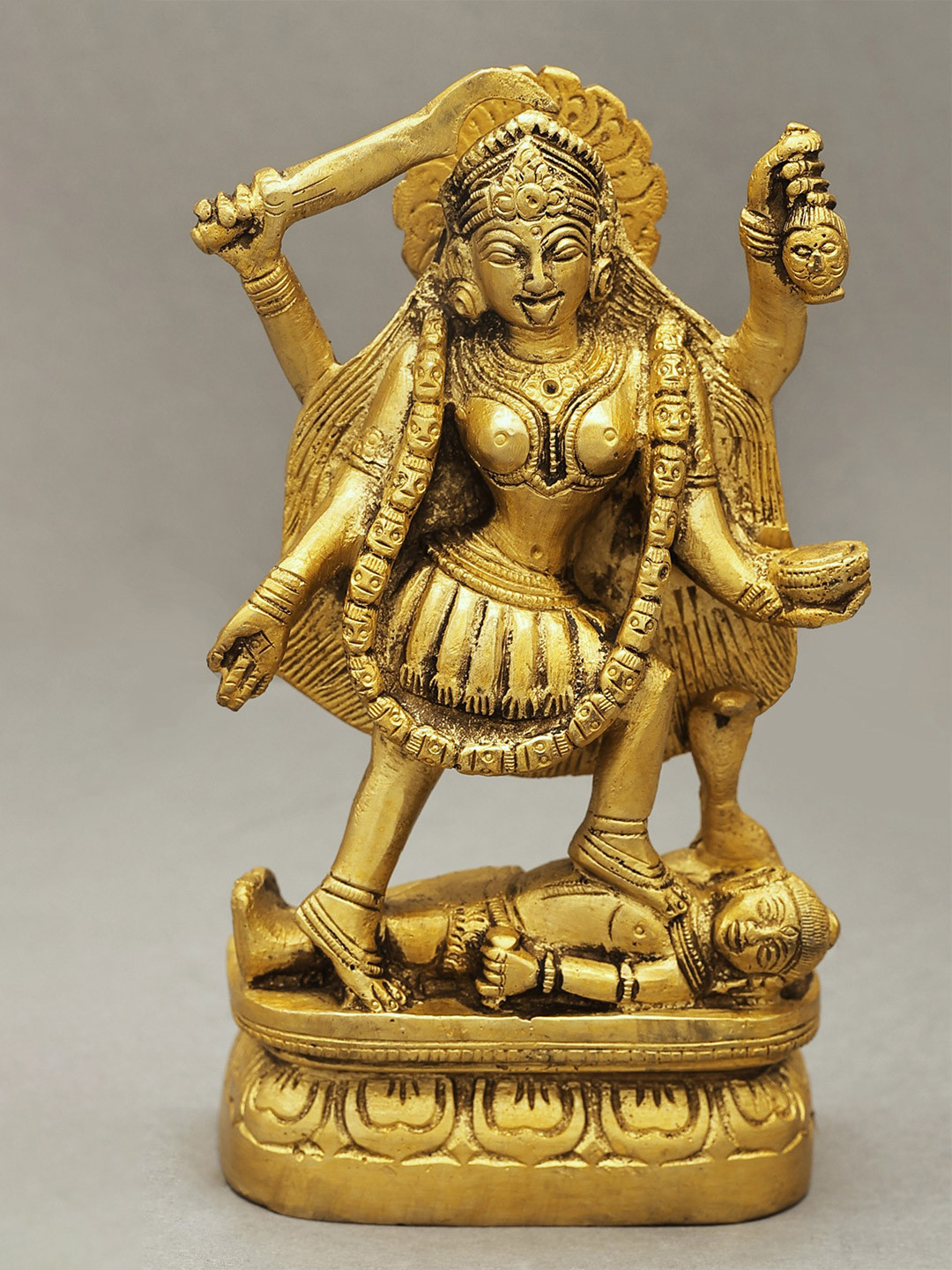Exotic India Gold Toned Goddess Kali Brass Showpiece