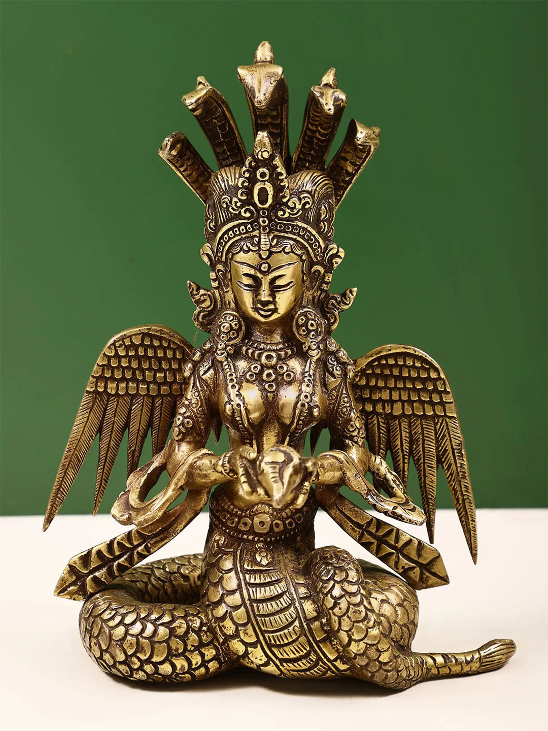 Exotic India Gold-Toned & Brown Naga Kanya Ulupi Showpiece