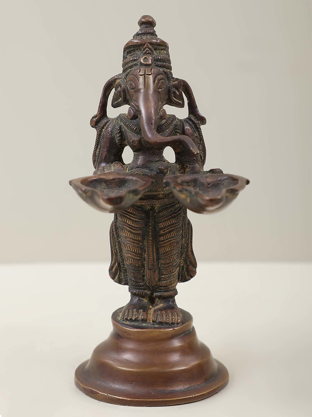 Exotic India Bronze Toned Lord Ganesha Twin Lamps Showpiece
