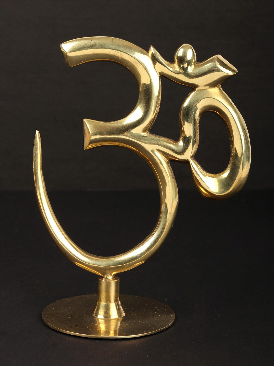 Exotic India Gold Toned Religious Om With Stand Idol Showpiece