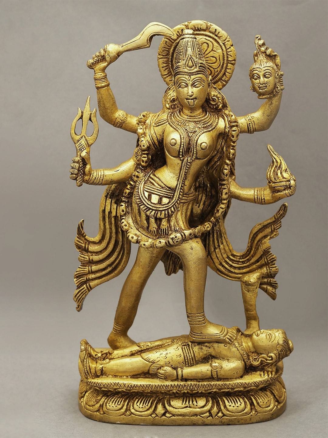 Exotic India Gold Toned Religious Goddess Kali Idol Showpiece