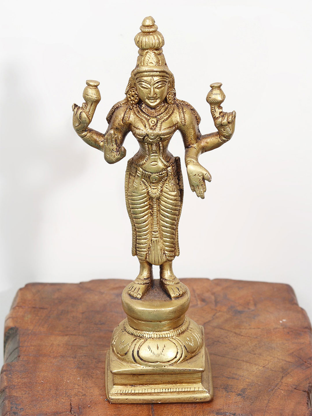 Exotic India Gold Toned Religious Armed Lakshmi Idol Showpiece