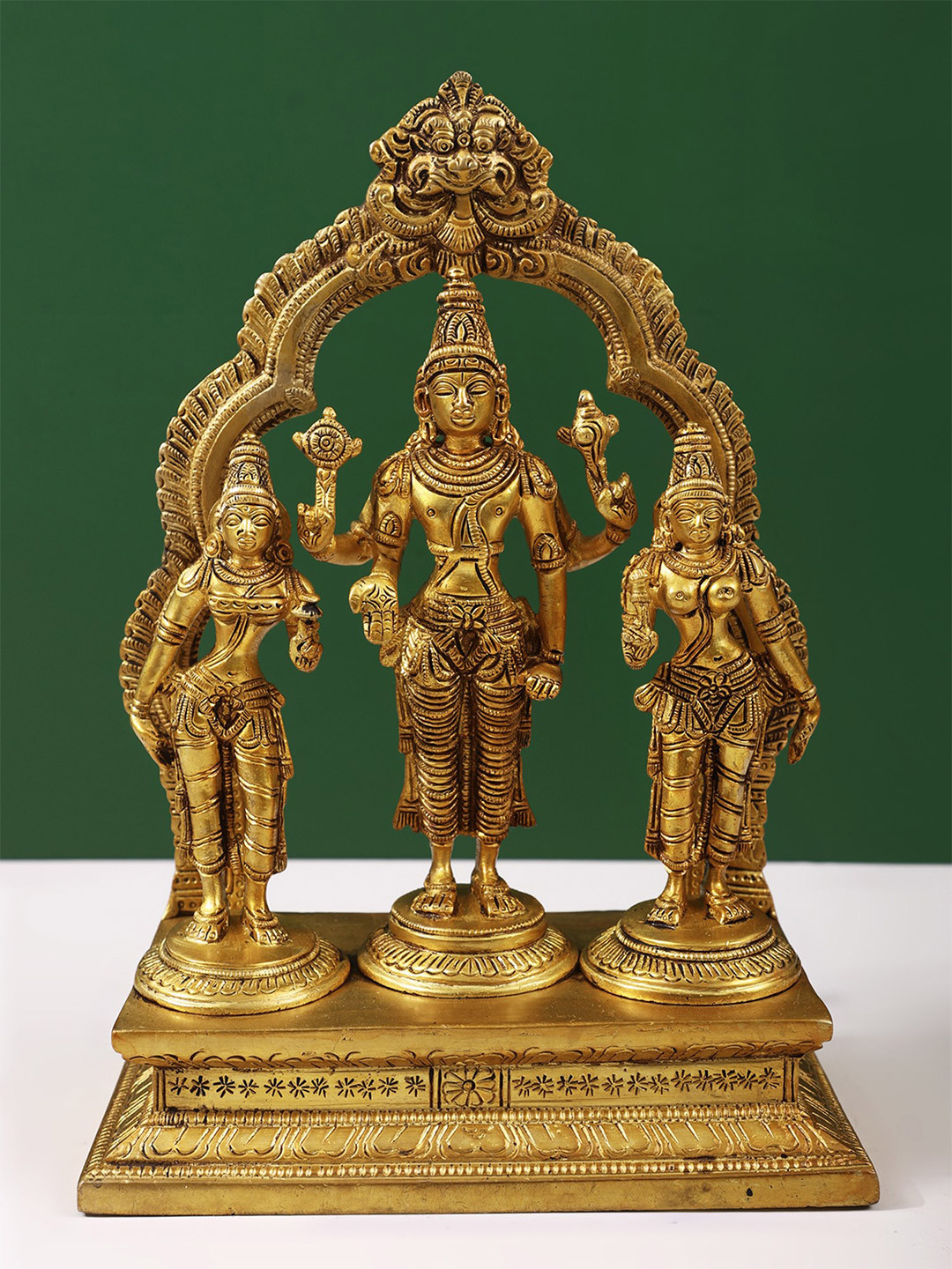 Exotic India Gold Toned Religious Brass Lord Vishnu with Shridevi & Bhudevi Showpiece
