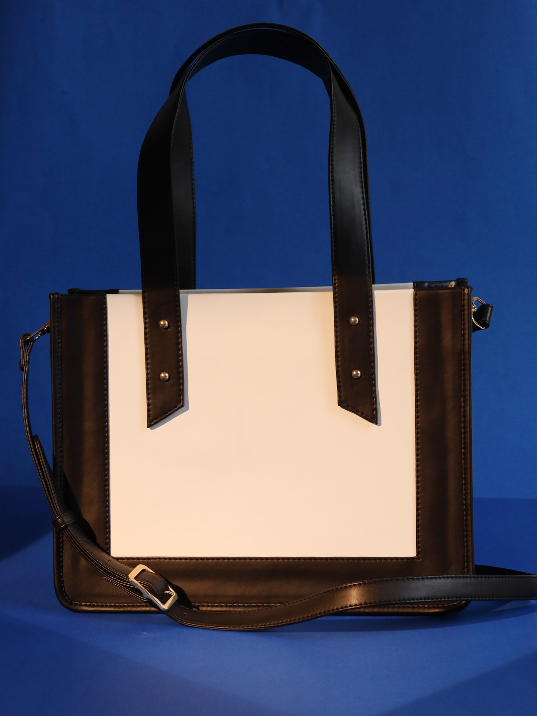 FERROCCIO Women Black Colourblocked Structured Handheld Bag