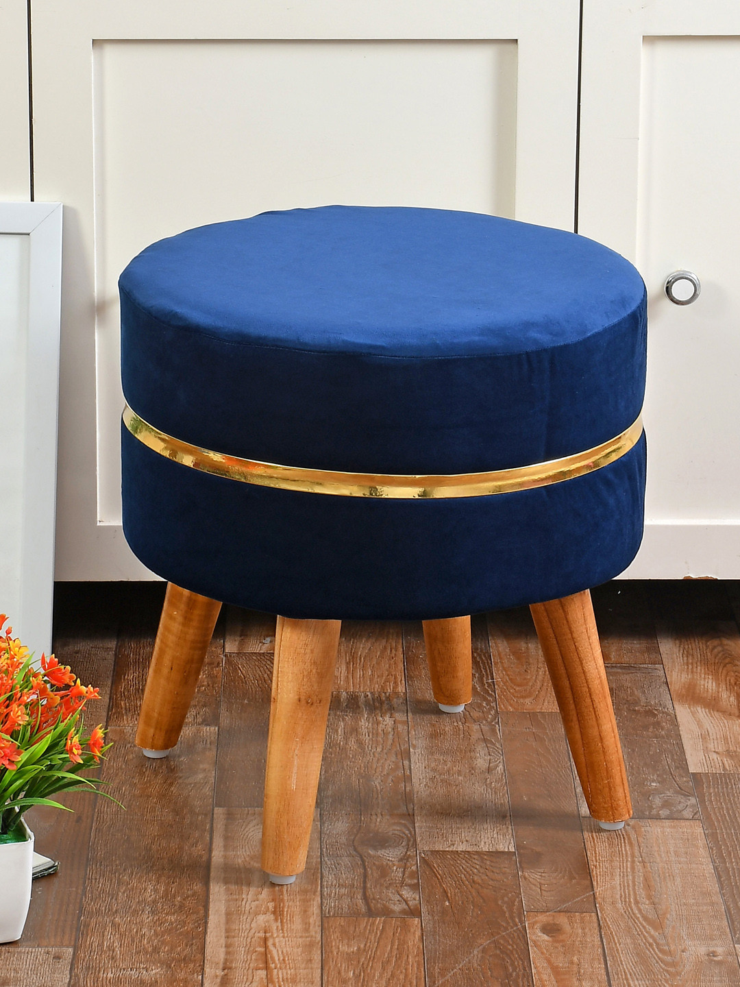 RIANCE CREATIONS Navy Blue Solid Ottoman With Golden Ring & Wood Legs