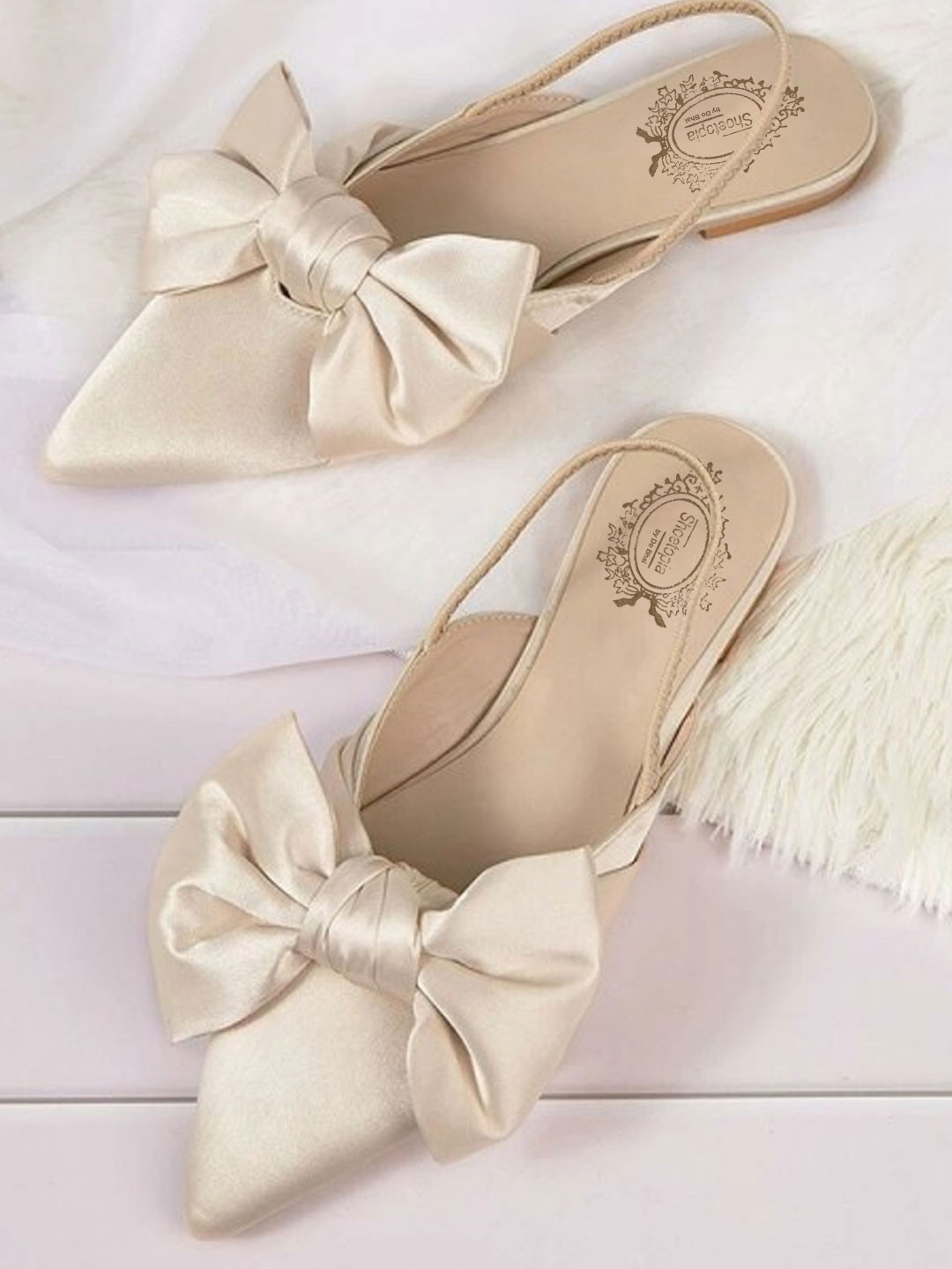 Shoetopia Women Cream-Coloured Mules with Bows