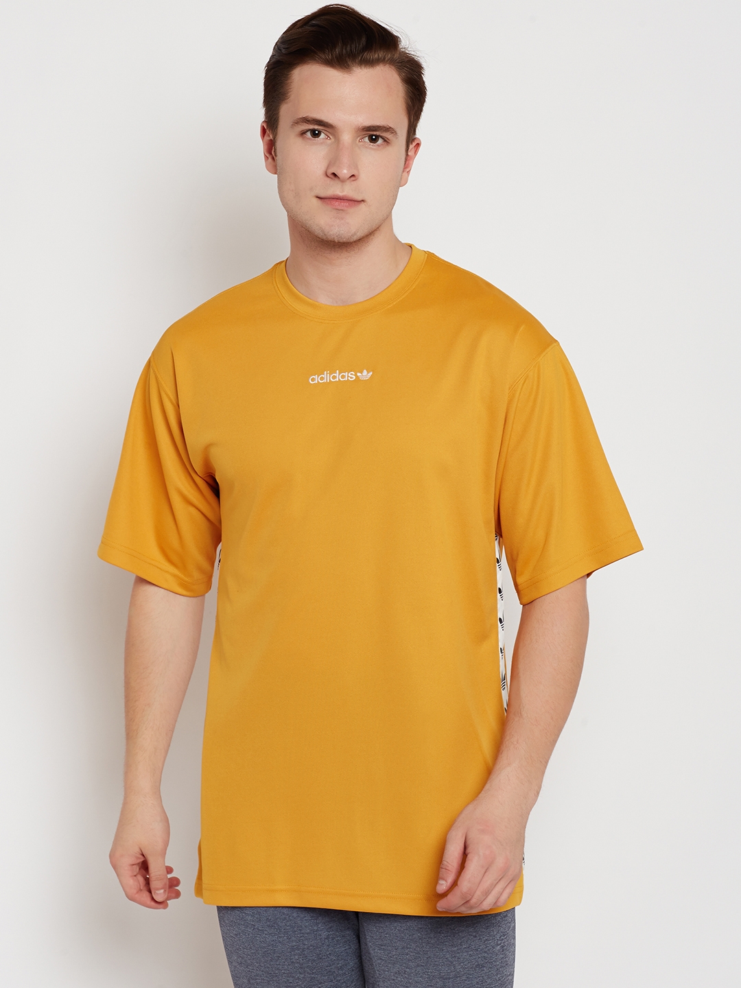 Hasta Zapatos antideslizantes Gran engaño Buy ADIDAS Originals Men Mustard Yellow TNT Tape Solid Round Neck T Shirt -  Tshirts for Men 2084071 | Myntra