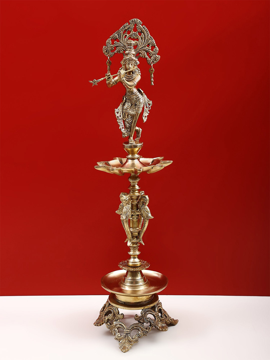 Exotic India Gold Toned & Black Religious Krishna Lamp Idol Showpiece