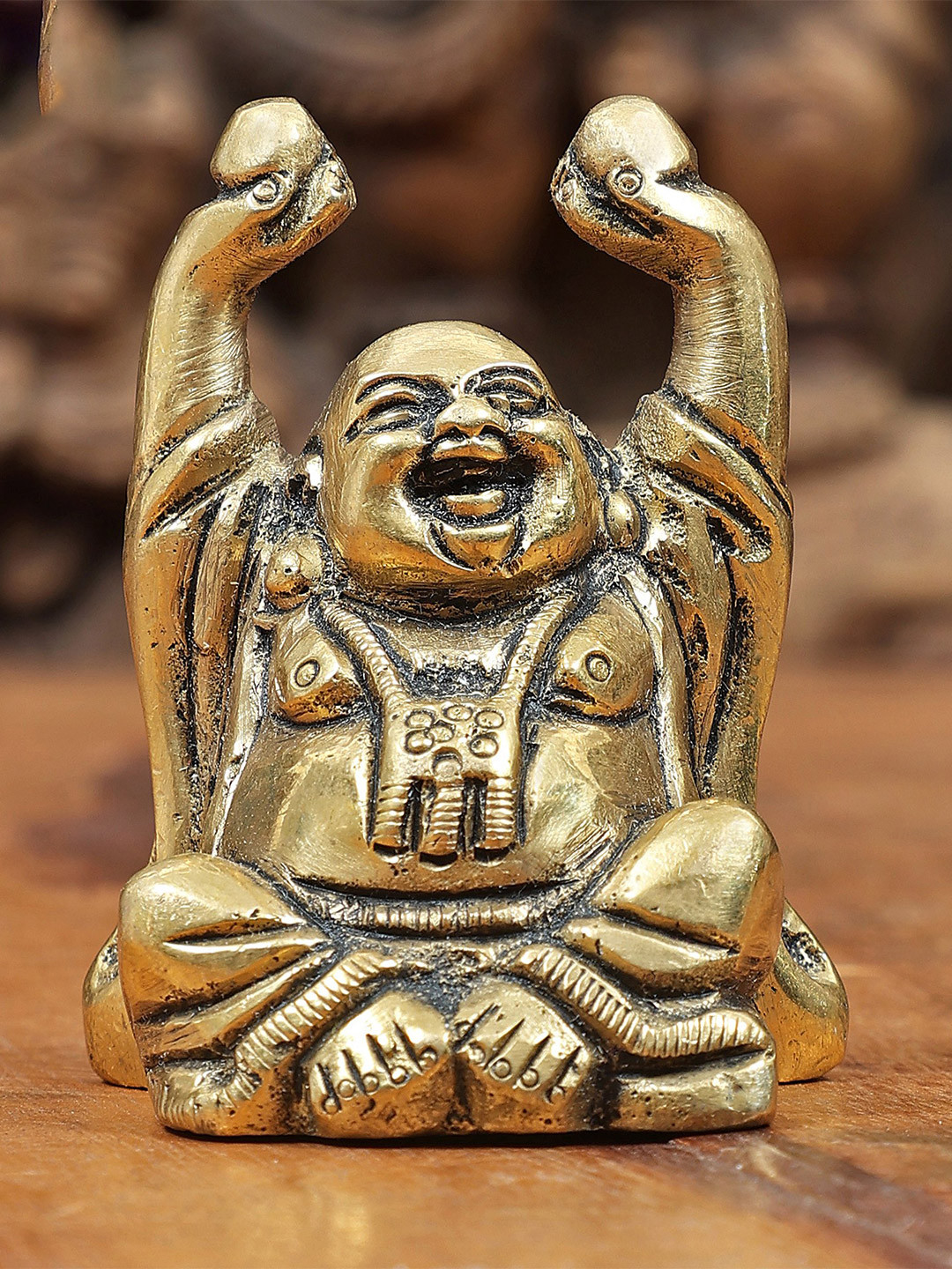 Exotic India Gold Toned Religious Laughing Buddha Carrying Wealth Balls Idol Showpiece