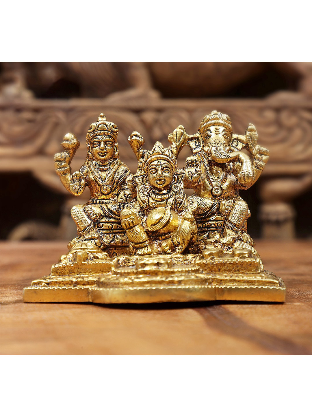 Exotic India Gold-Toned Religious Lakshmi Ganesha and Kubera Idol Showpiece