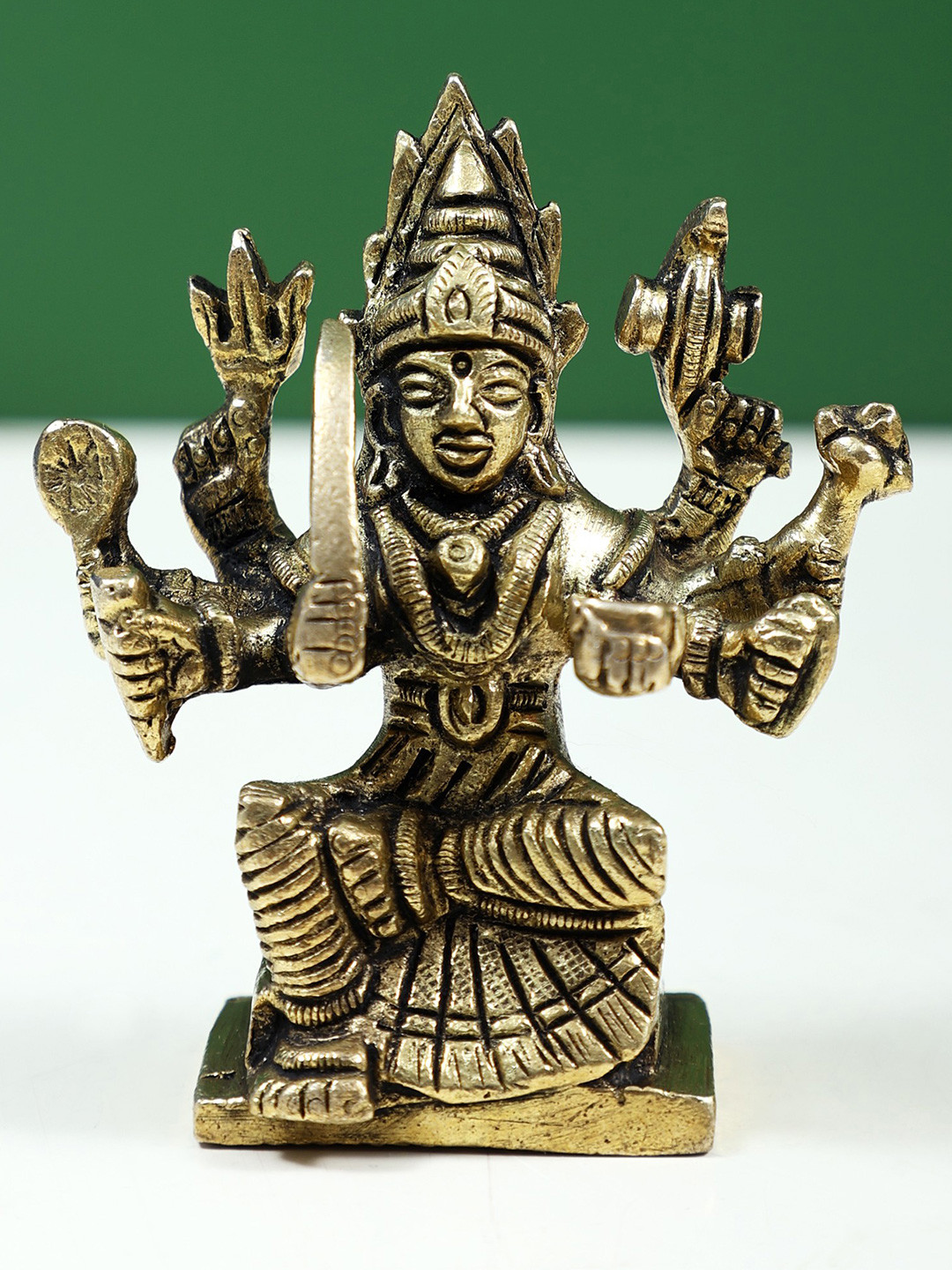 Exotic India Gold Toned Mariamman Showpiece