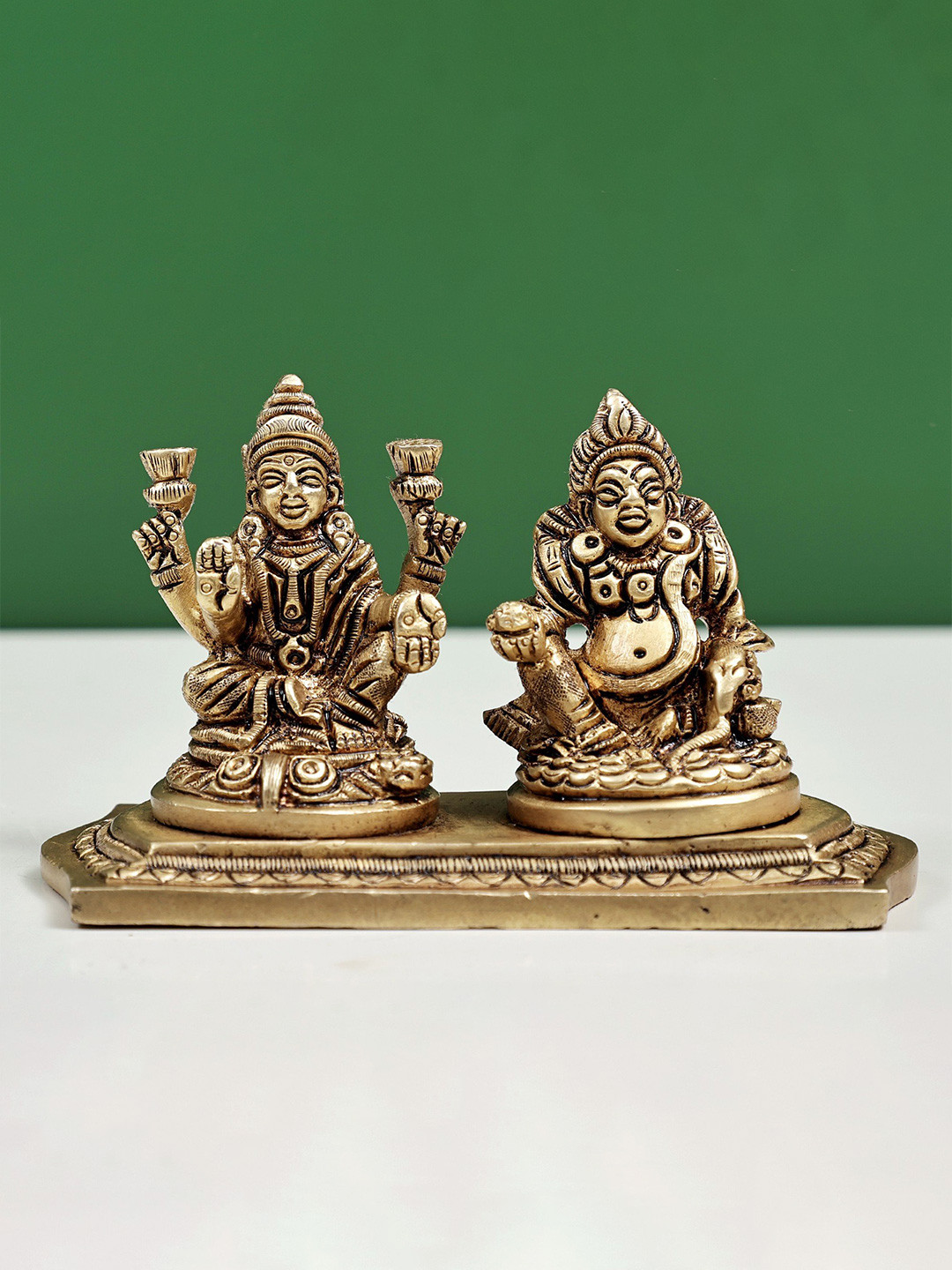 Exotic India Gold Toned Goddess Lakshmi and Lord Kuber Religious Showpiece