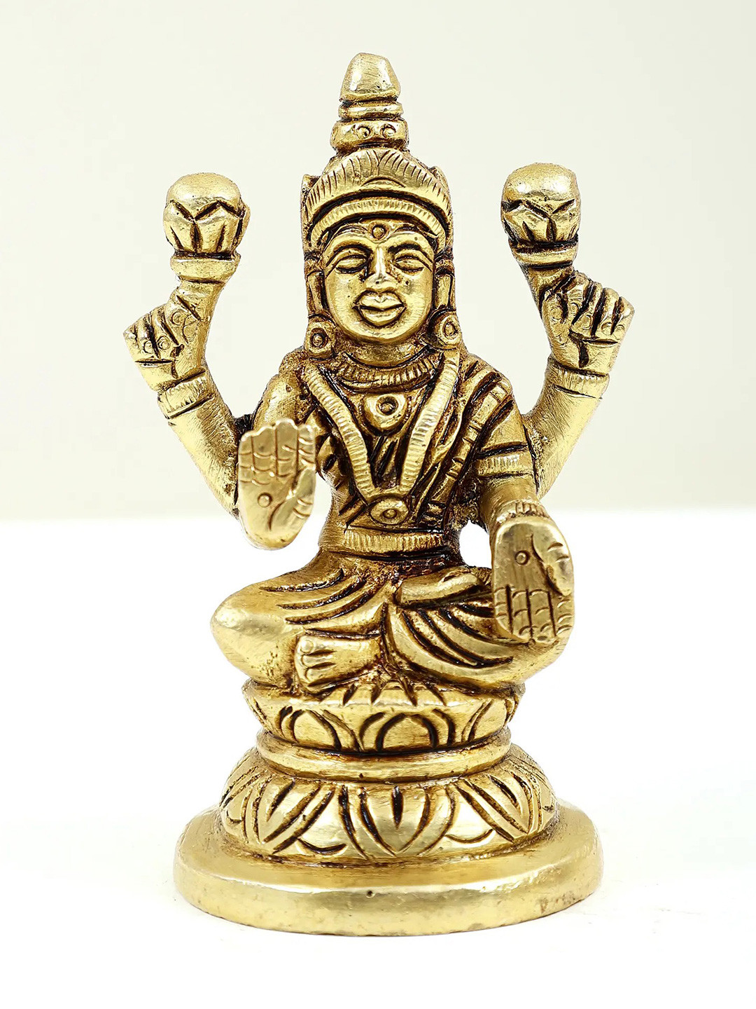 Exotic India Goddess Lakshmi Sitting on Pedestal Statue Showpiece