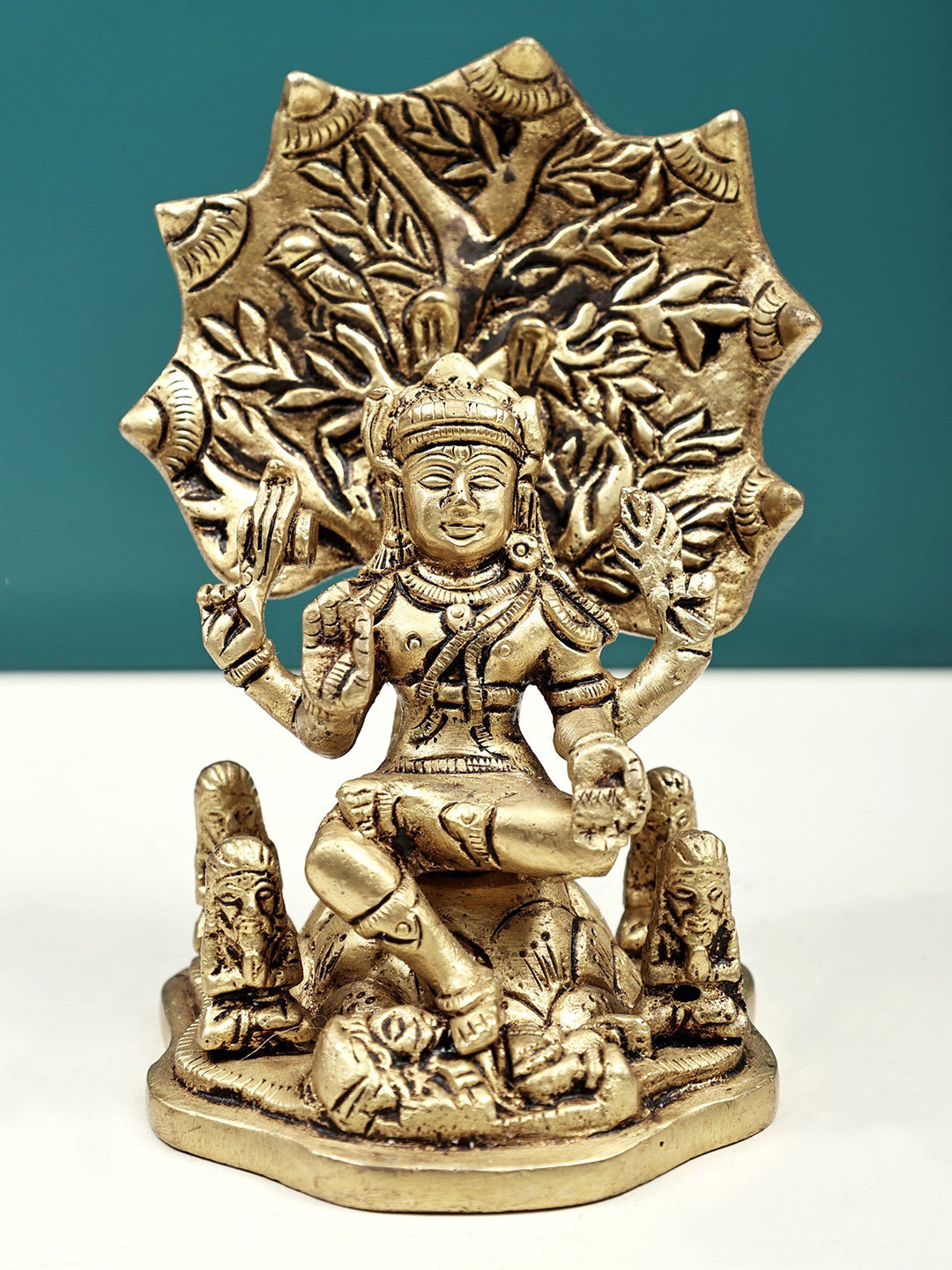 Exotic India Gold Toned Lord Dakshinamurty Religious Idol Showpiece