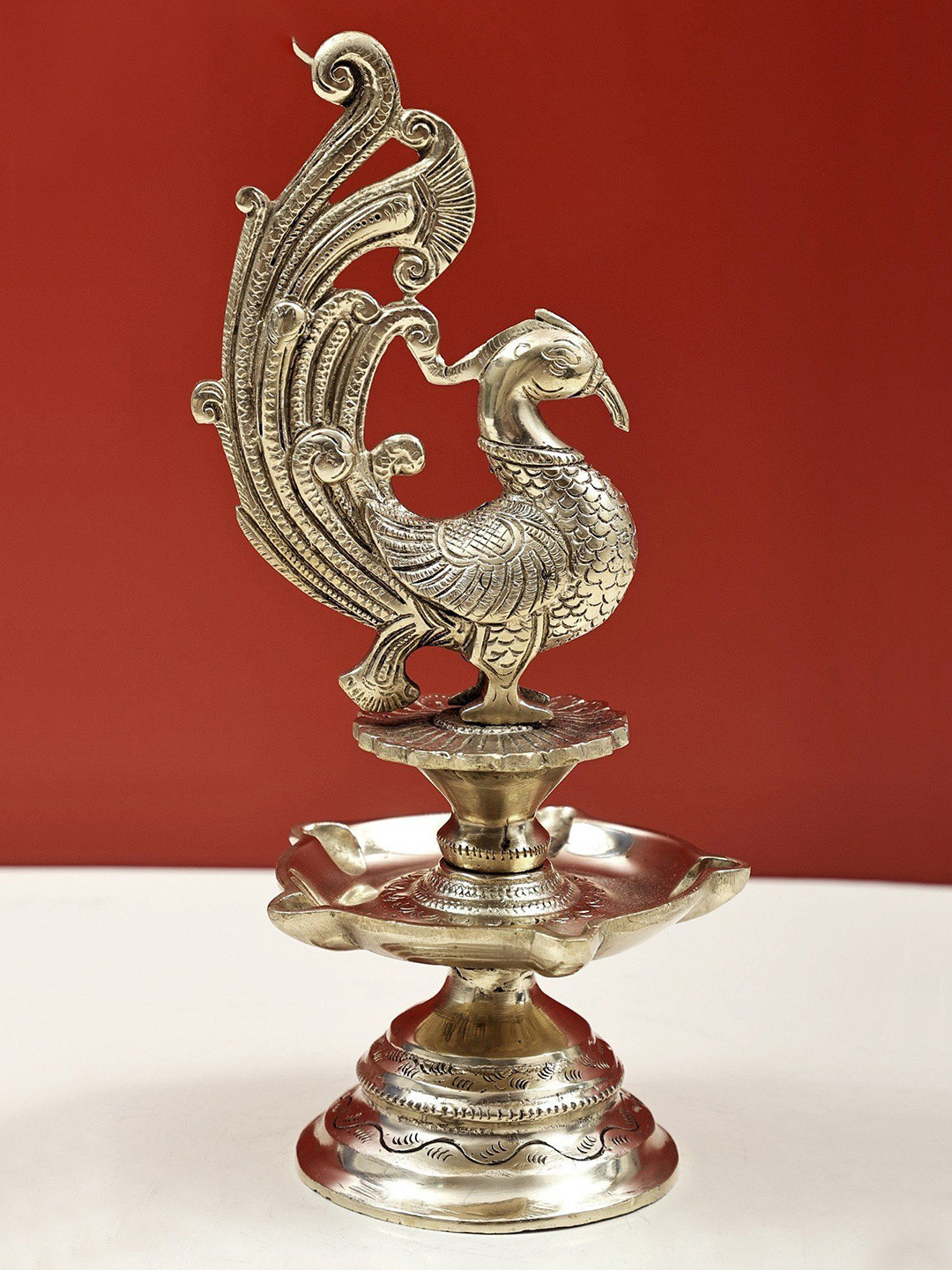Exotic India Gold-Toned Five Wicks Peacock Lamp