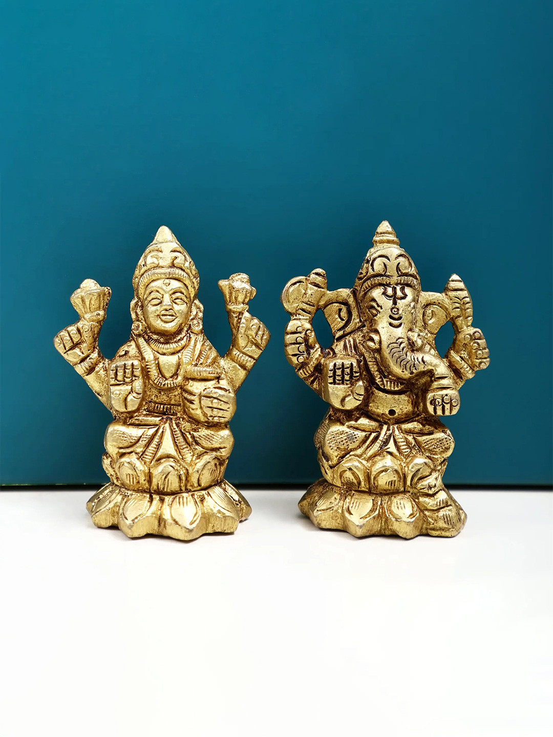 Exotic India Gold Toned 2 Pieces Lord Ganesha & Goddess Lakshmi Religious Idol Showpieces