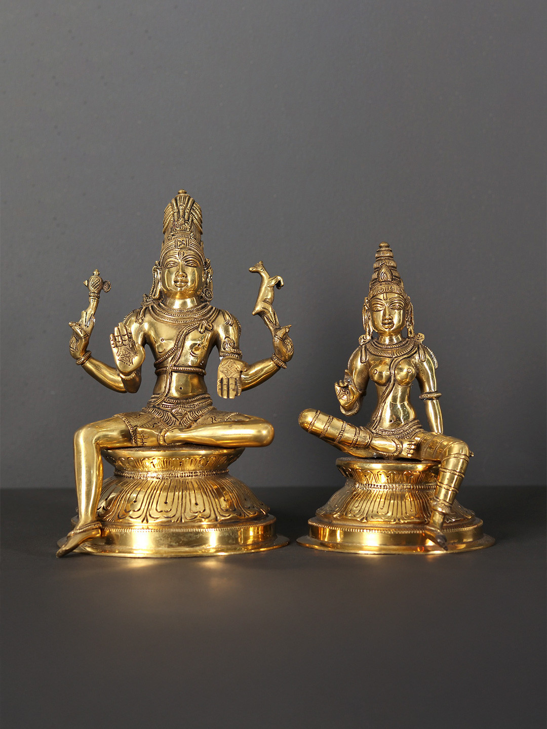 Exotic India Gold Toned 2 Pieces Seated Pashupatinath And Parvati Brass Showpiece