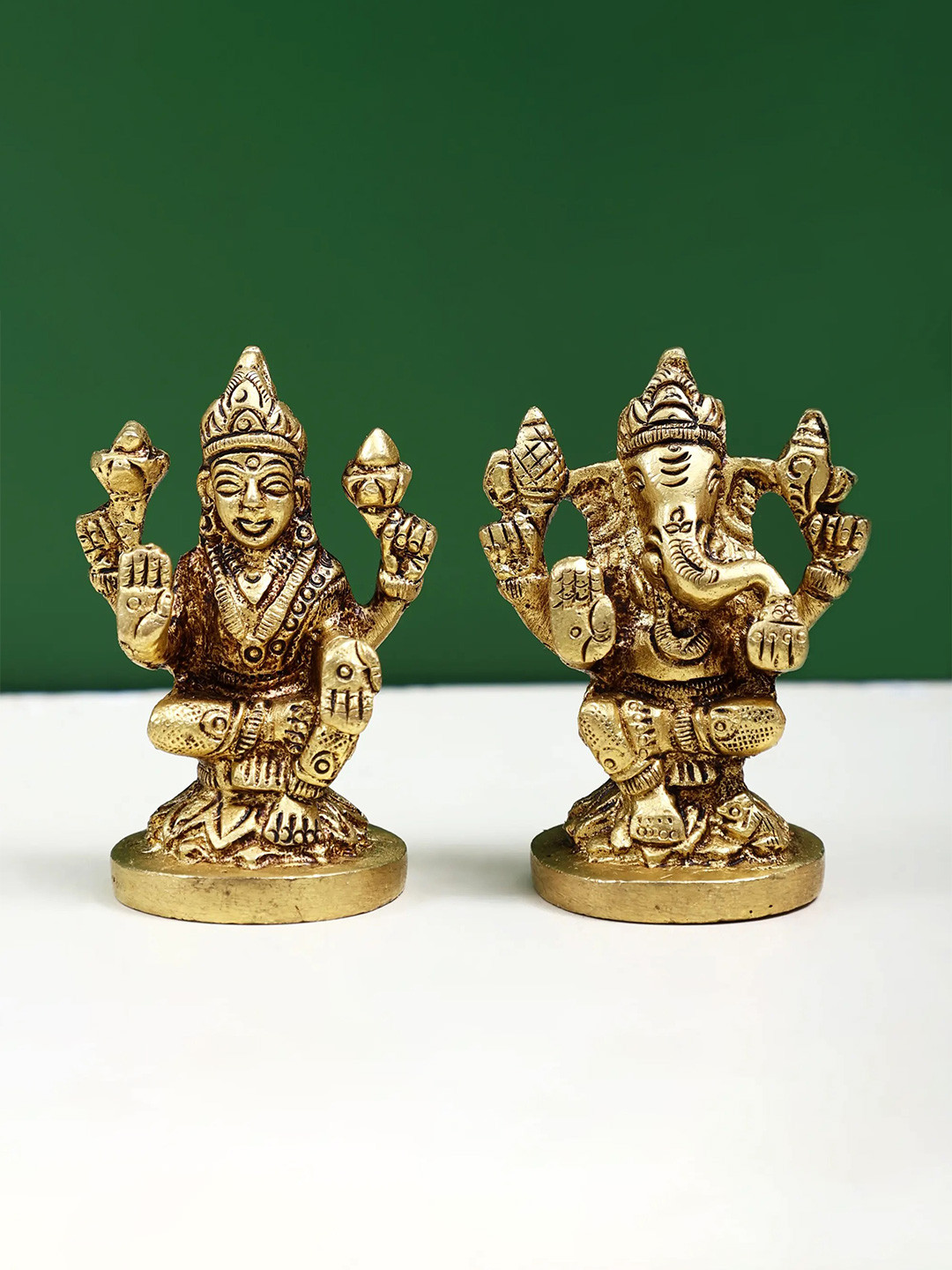 Exotic India Gold Toned 2 Pieces Lakshmi and Ganesha Religious Statue Showpieces