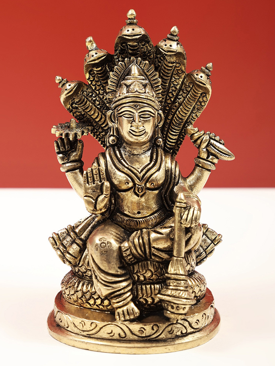 Exotic India Gold-Toned & Black Bhagawan Vishnu Seated On Sheshnag Brass Statue