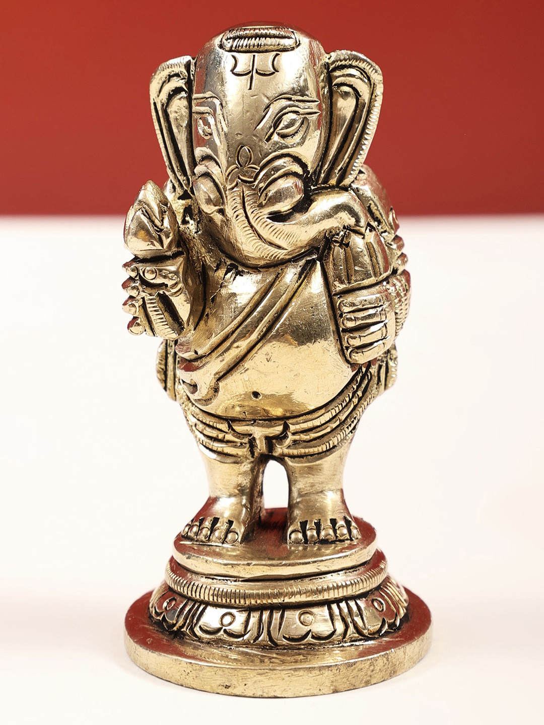 Exotic India Gold-Toned & Black Lord Ganesha With Lotus Showpiece