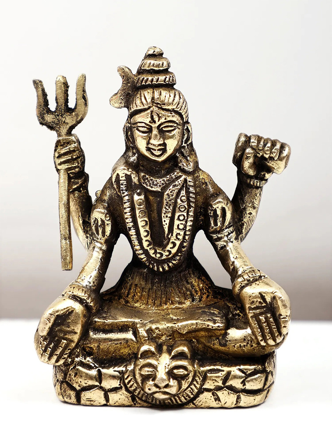 Exotic India Gold Toned Small Lord Shiva Religious Idol Showpiece