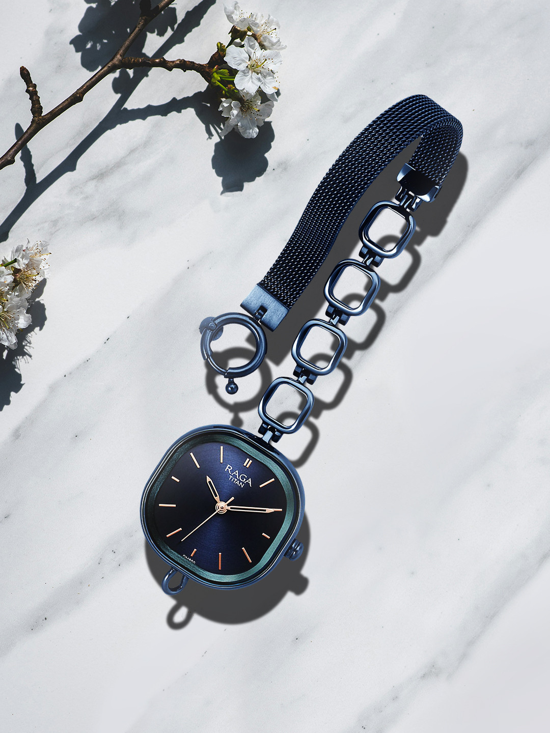 Titan Women Blue Brass Dial & Blue Stainless Steel Bracelet Style Straps Analogue Watch 2693QM01