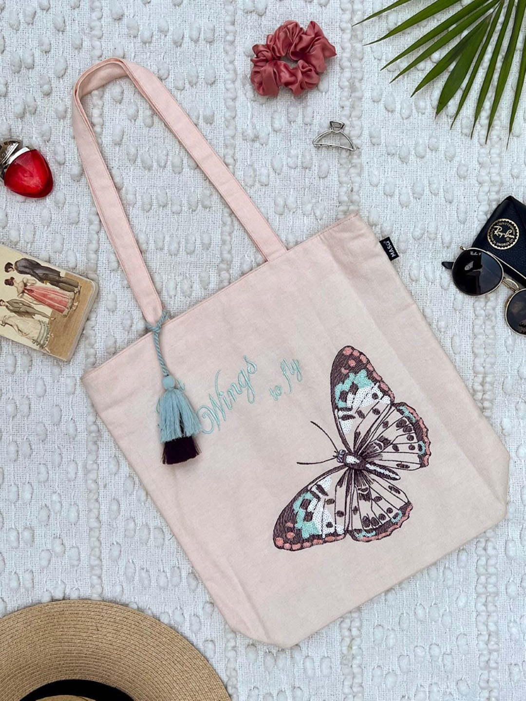 MASQ Peach-Coloured Printed Half Moon Tote Bag with Tasselled