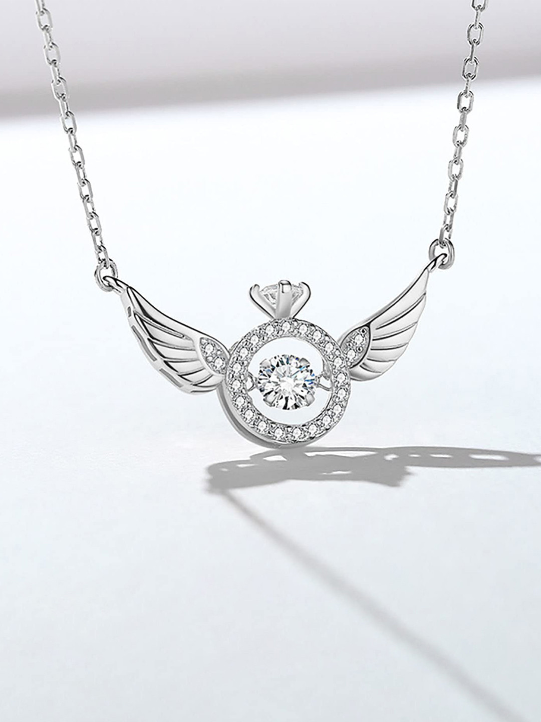 Jewels Galaxy Silver-Toned Stone-Studded Angel Wings Pendant With Chain