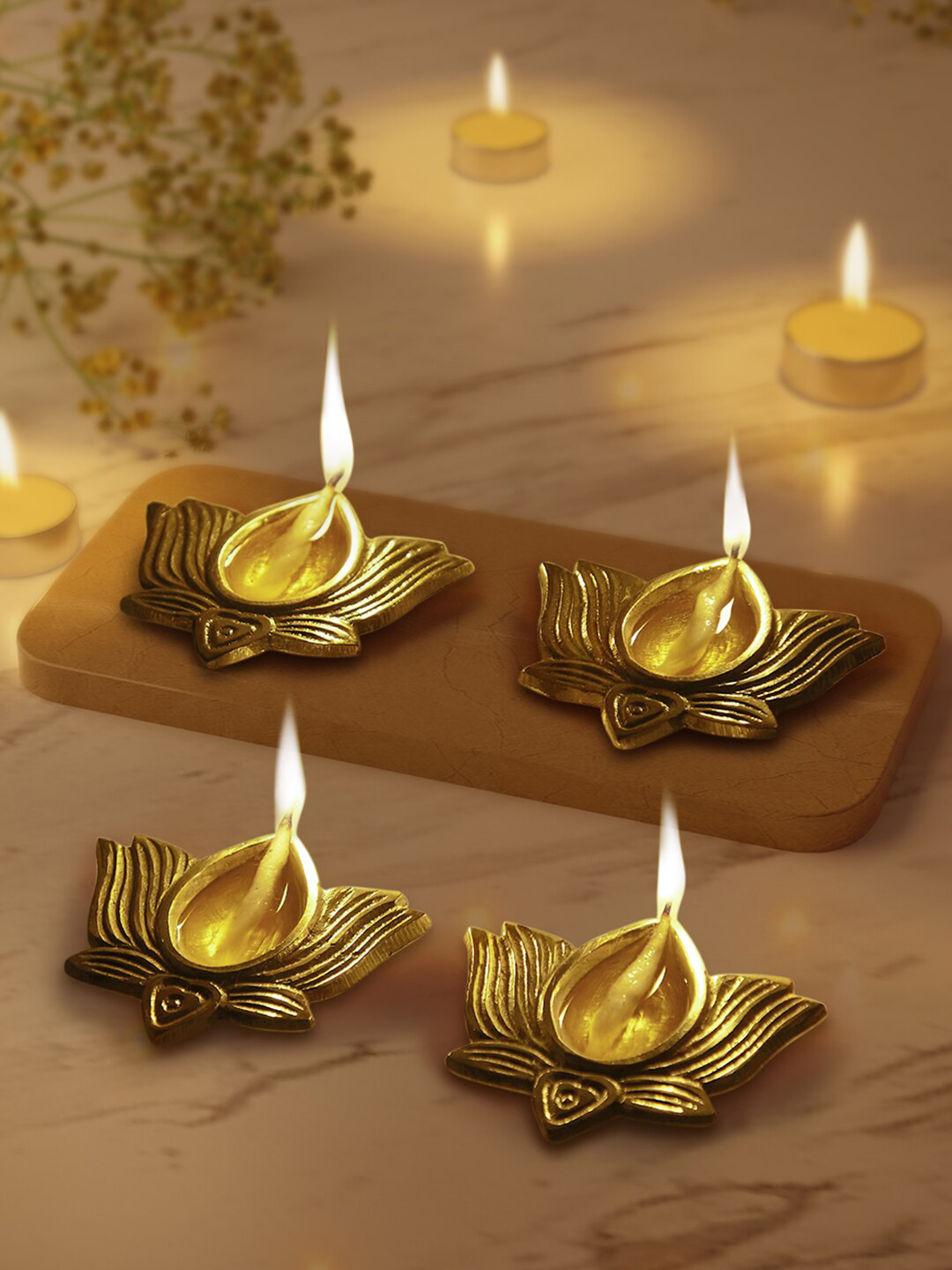 Living scapes by Pantaloons Gold-Toned Set Of 4 Diyas