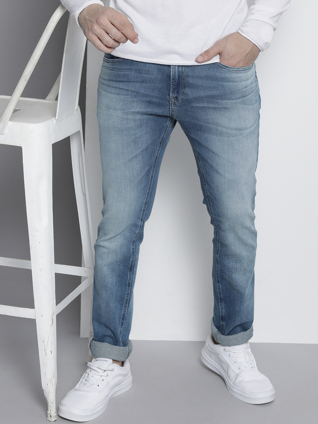 Tommy Hilfiger Men Scanton Slim Fit Mid Rise  Heavy Fade Stretchable Jeans