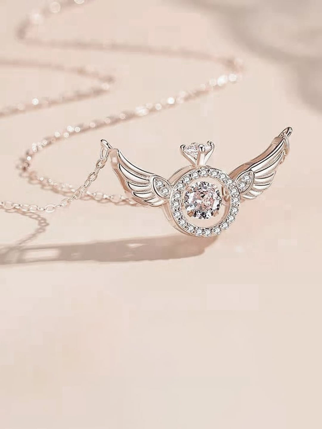 Designs By Jewels Galaxy Silver-Plated Stone-Studded Angel Wings Pendant With Chain