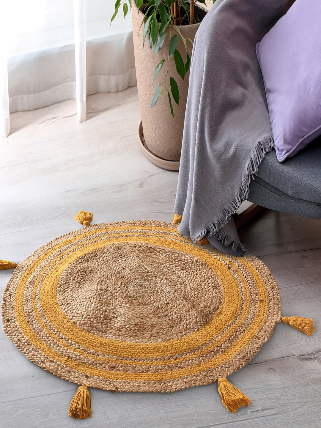 SASHAA WORLD Beige & Mustard Yellow Jute Braided Round Floor Mat With Tassels