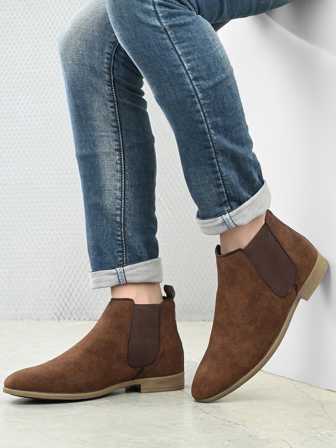 Chelsea store boots myntra