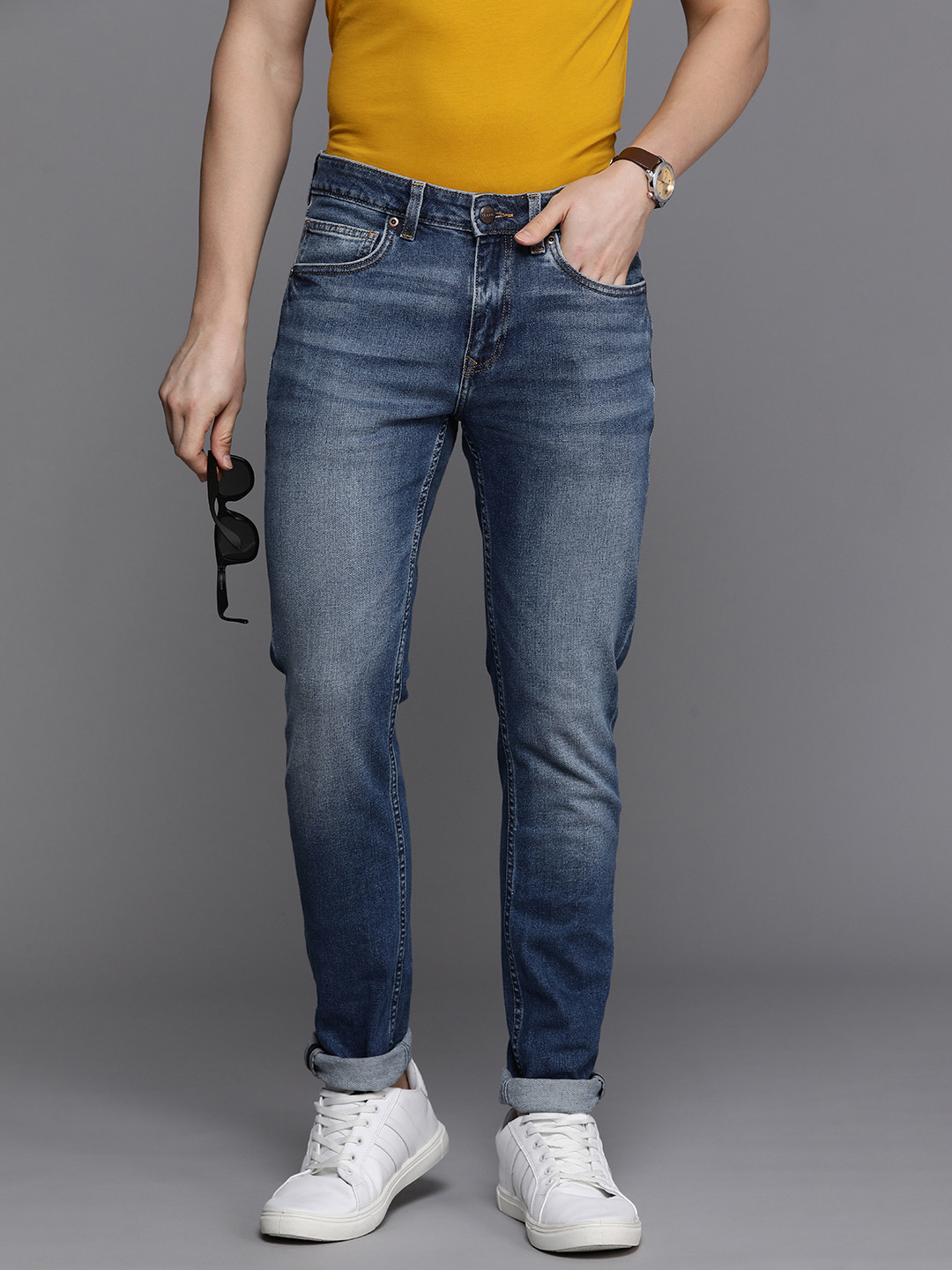 Louis Philippe Jeans Men Tapered Fit Mid-Rise Light Fade Stretchable Jeans