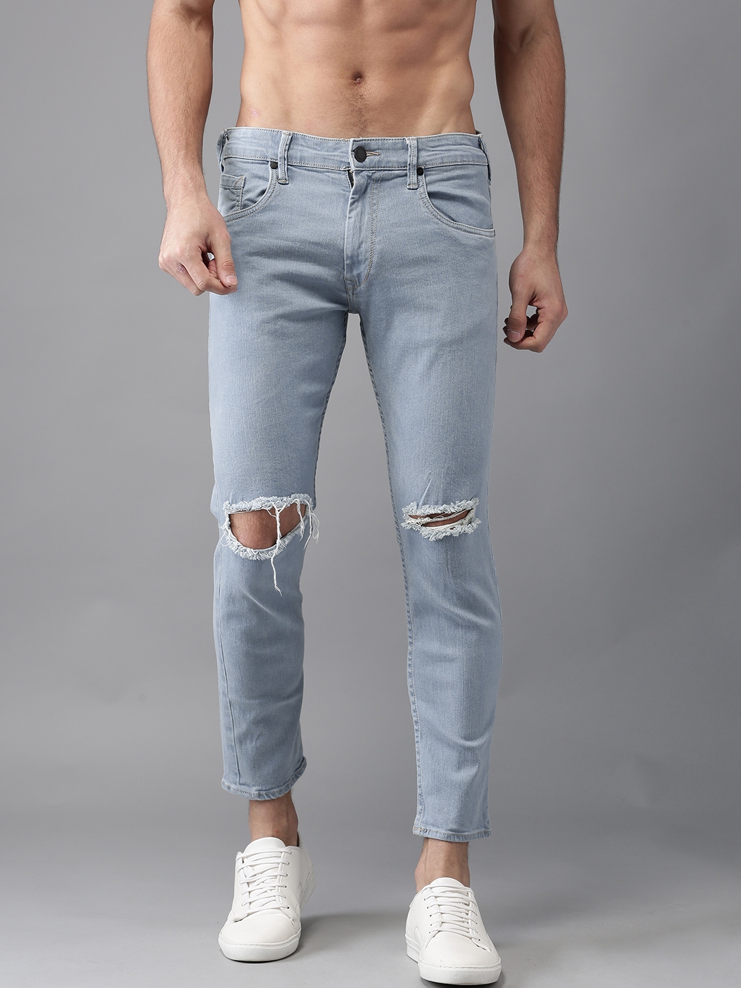 Mid rise destructed slim crop jeans