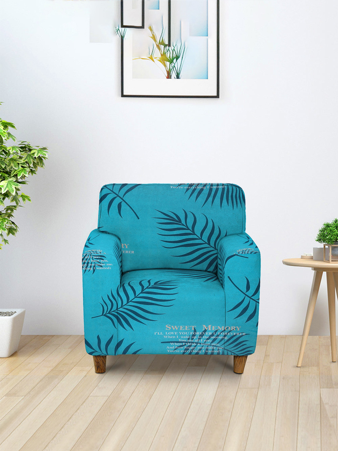 Cortina Turquoise Blue & Black Leaf Printed Stretchable 1-Seater Sofa Cover