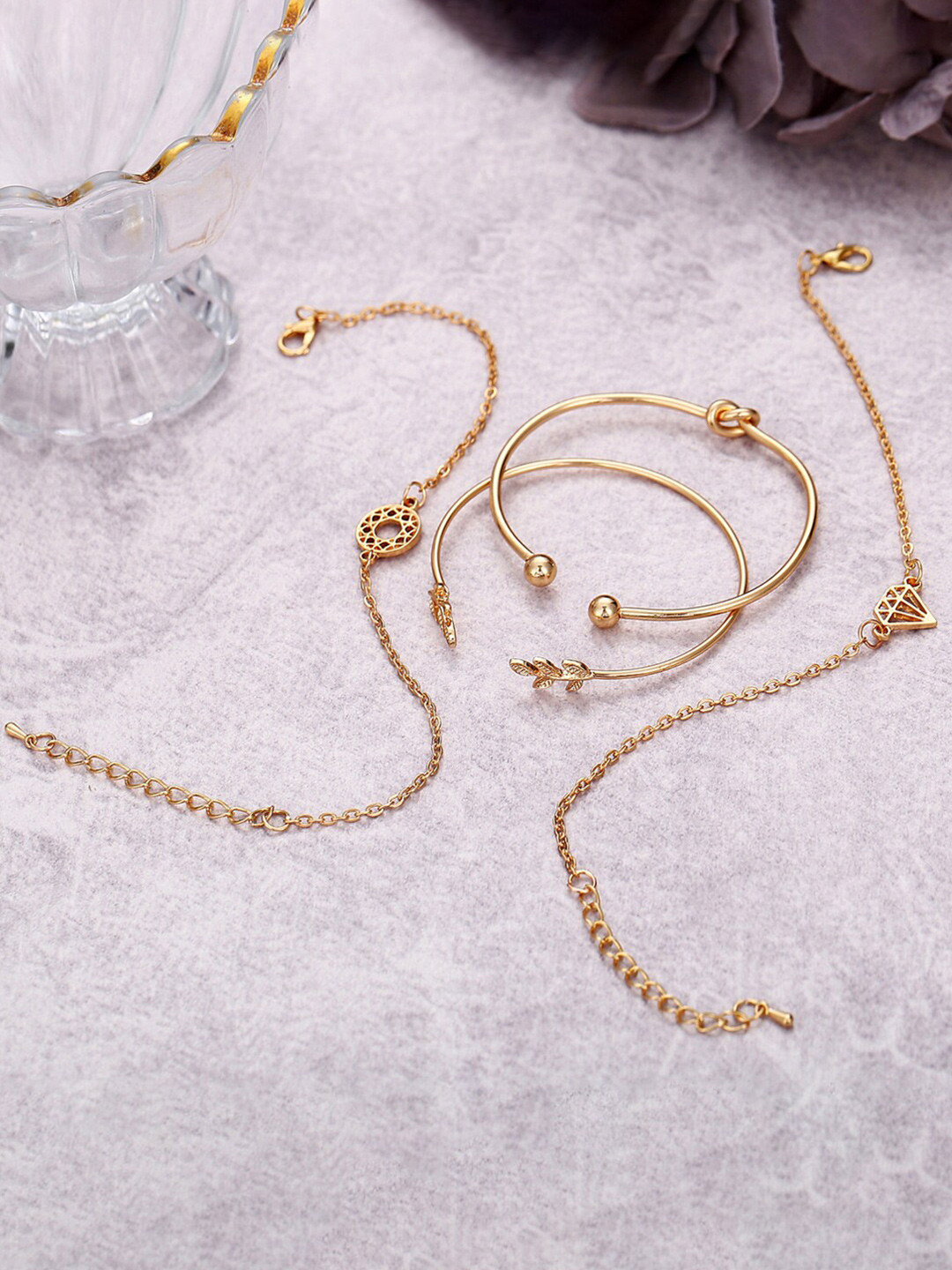 Jewels Galaxy Women Pack Of 4 Gold-Plated Charm Bracelets