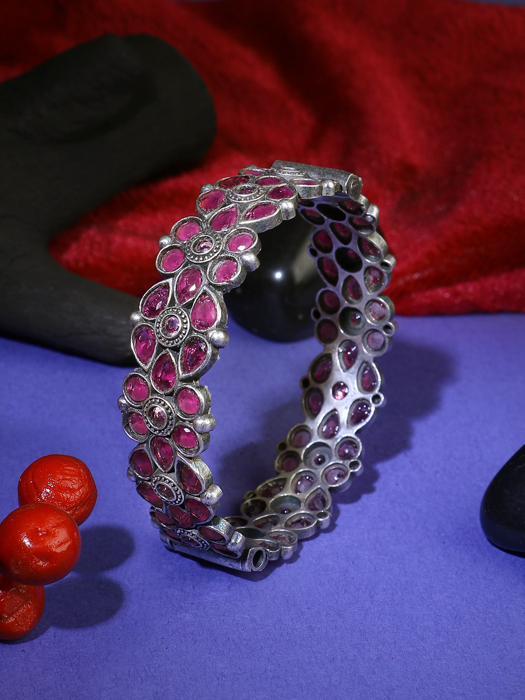 Adwitiya Collection Oxidised Silver Plated Stone-Studded Flower Pattern Bangle