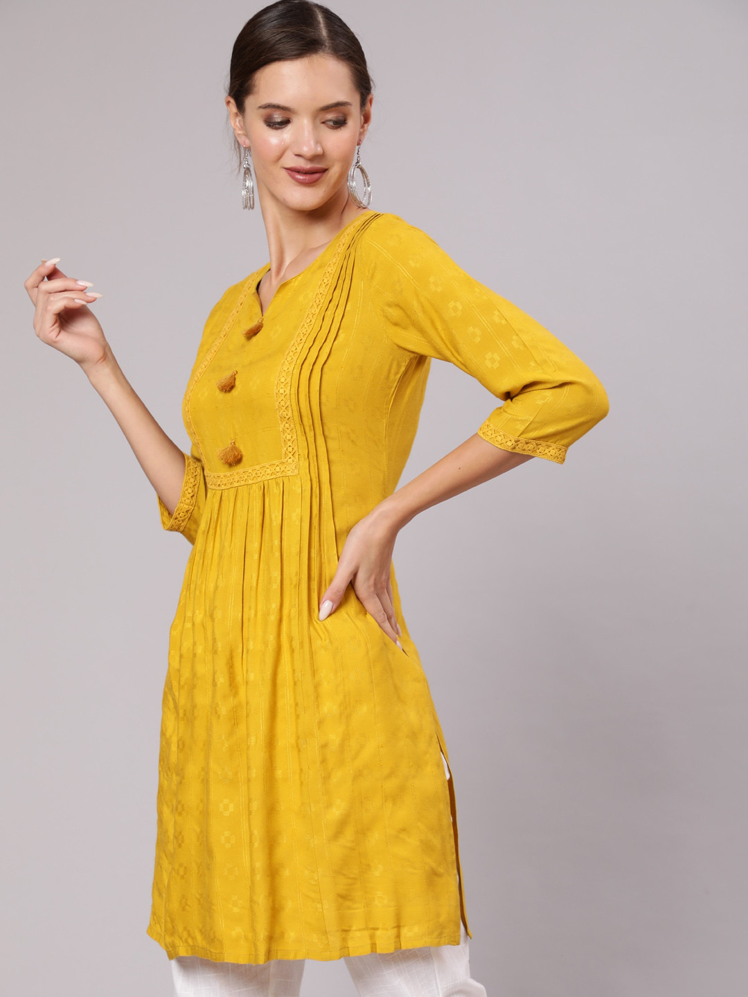 Jaipur Kurti Self Weave Pleated, Laced-Up And Gathered Short Kurta With Tassels