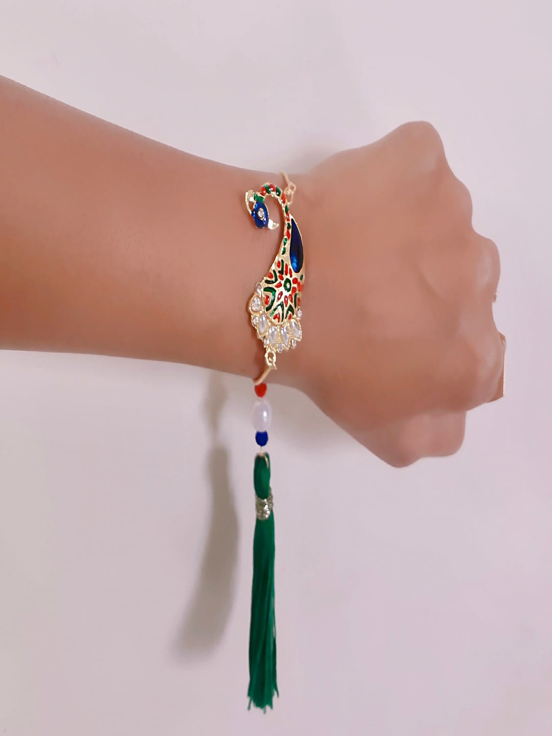 Mahi Women Peacock Shaped Meena Work Lumba Wraparound Rakhi
