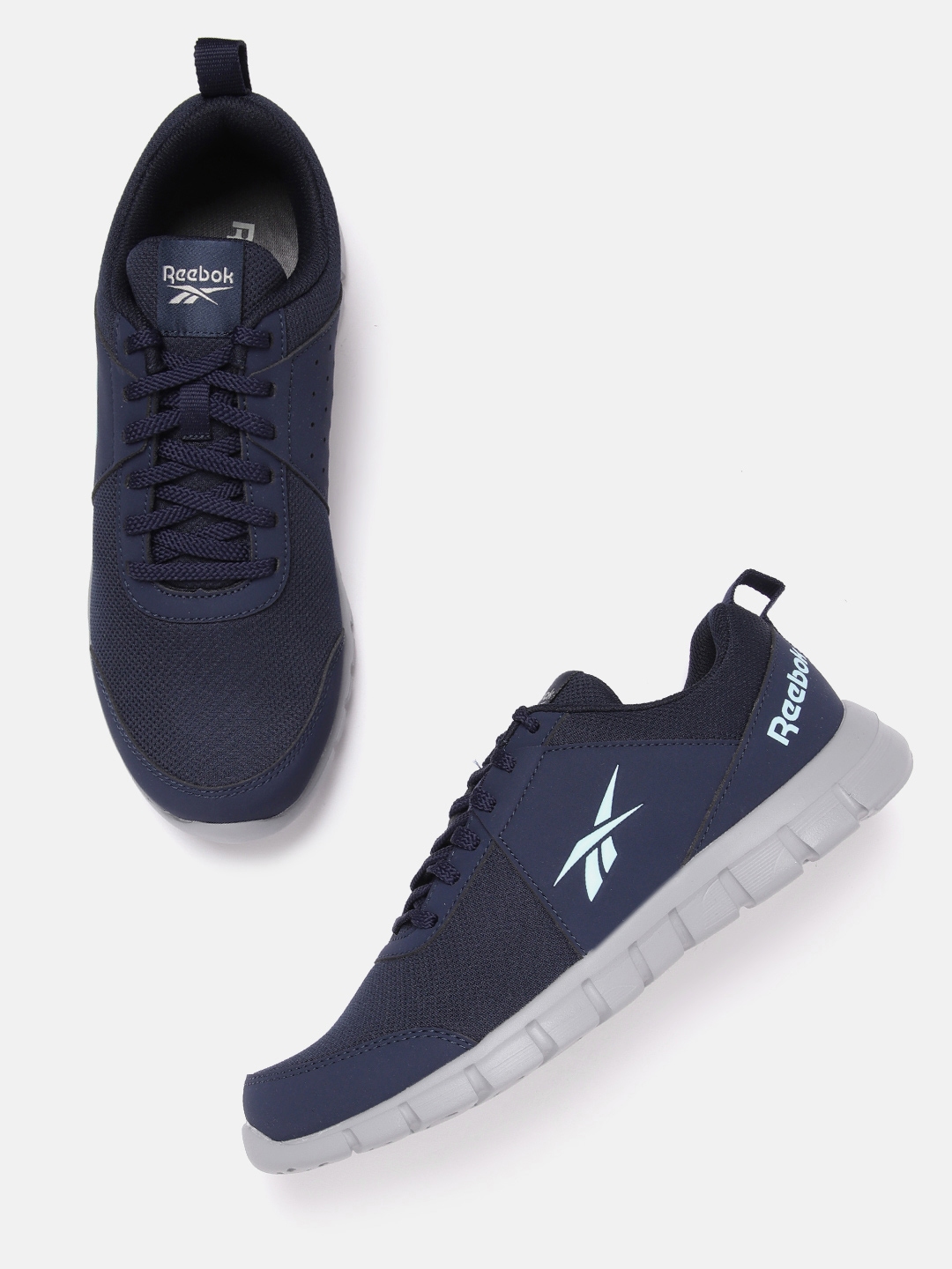 Buy Reebok Men Perforated Detail Traveller LP Running Shoes Sports Shoes for Men 21819256 Myntra