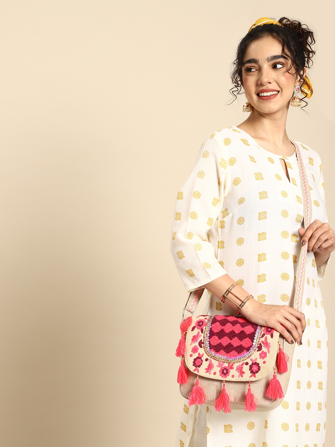 Buy Sangria Floral Embroidered Sling Bag with Tasselled Detail Handbags for Women 21866110 Myntra